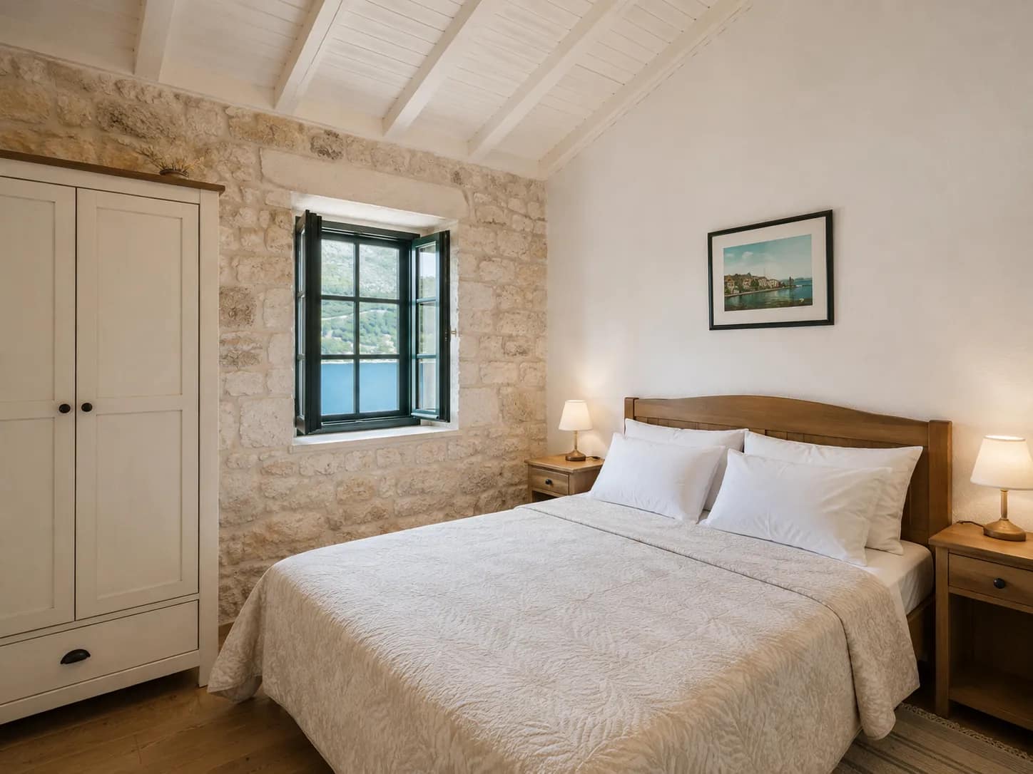 The bed sits under the highest part of the roof